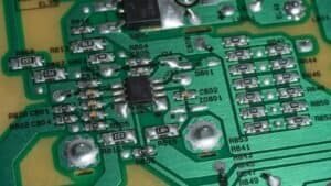 Electronic board with components and soldering, similar to the control unit of a boiler